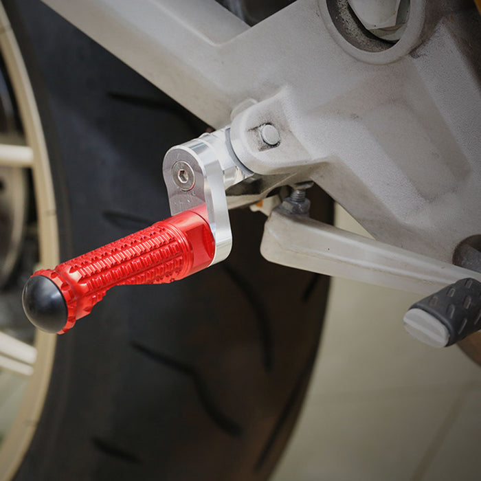 Rear 25mm extension foot pegs for Aprilia RSV1000 Tuono V4R, black MC Motoparts M-PRO motorcycle foot pegs installed
