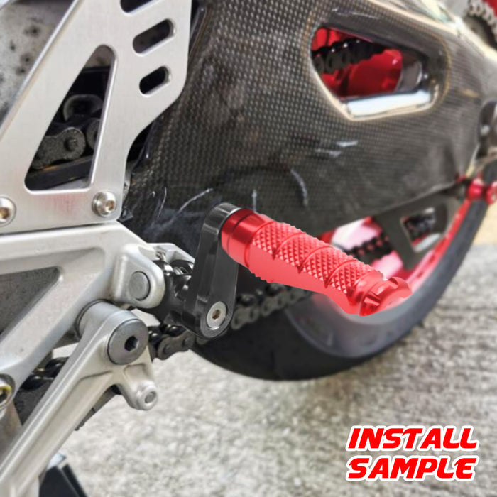 Rear 40mm adjustable foot pegs for Honda CBR1000RR-R, CB125R, Rebel 500 by MC Motoparts, showing installation on motorcycle.