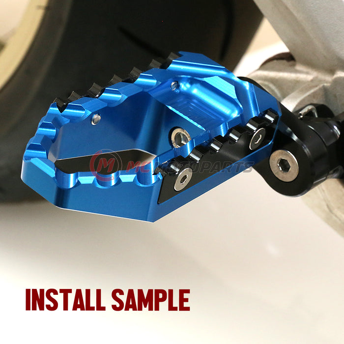 Rear 25mm extension touring foot pegs for Kawasaki ZH2 ZX-10R Ninja, made by MC Motoparts, installed on wide adjustable footrests.