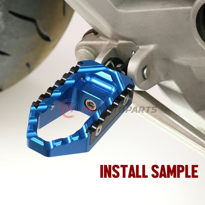 Rear touring wide foot pegs for Kawasaki ZH2, ZX-10R, Z E-1 Ninja, and TRC models by MC Motoparts, shown installed on motorcycle.